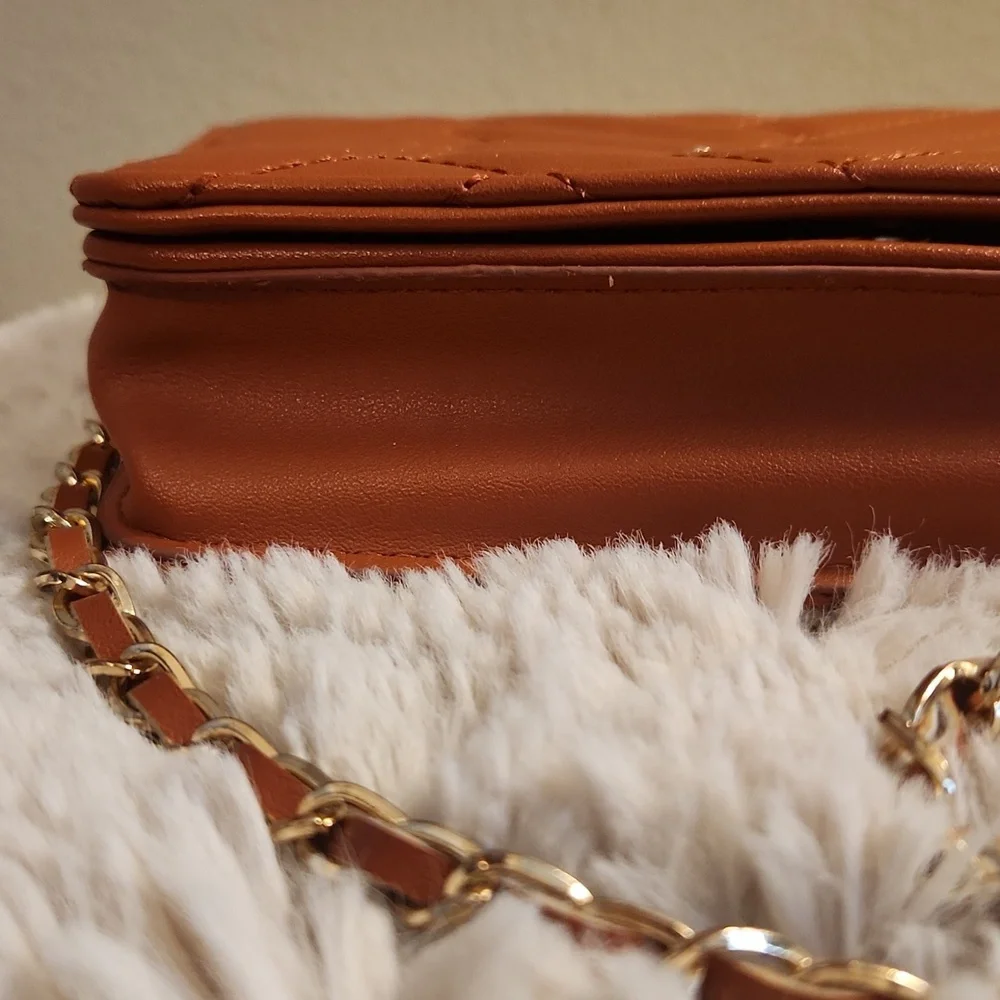 Bebe quilted bag with Gold rope chain cross body bag. Gently Used - Picture 2 of 16